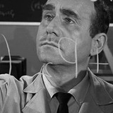 Byron Kane — Reporter (uncredited)