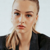 Lilly Krug — The Receptionist