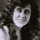 Leah Baird — Police Matron (uncredited)