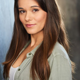 Chloé Malaisé — Female Newscaster (voice)