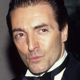 Armand Assante — Cmdr. Dwight Towers