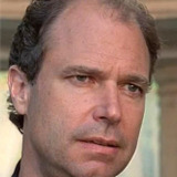 Malcolm Stewart — Mr. Harnsberger