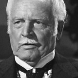 Forbes Murray — Judge at Margot's Trial (uncredited)