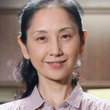 Kumi Nakamura — Taro's wife