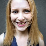 Audrey Quoturi — A passenger in the metro (uncredited)