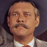 Don C. Harvey — Hotel Doorman (uncredited)