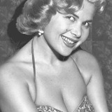 Gloria Pall — Blonde Girlfriend (uncredited)