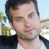 Zachary Culbertson — Business Man in Cadillac (uncredited)