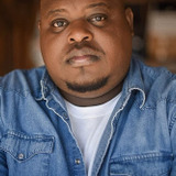 Erron Jay — Prisoner (uncredited)