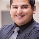 Alan Trujillo — Convention Goer / Arms Buyer (uncredited)