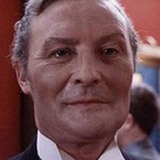 Donald Pickering — TV Announcer (uncredited)