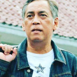 Joshua Pandelaki — Mr. Taufik