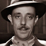 Antonio Bravo — Antiques dealer (uncredited)