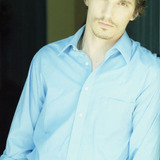 Chris Burns — Bicycle Zombie (uncredited)