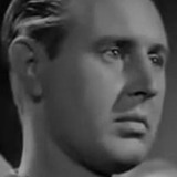 Vernon Downing — Giles (uncredited)