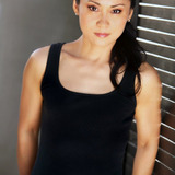 Ming Qiu — Achilles Businesswoman (uncredited)