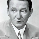 Charles Sherlock — Man Trying to Subdue Norman at Banquet (uncredited)