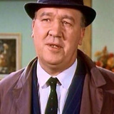 Martin Wyldeck — Sir George's Aide (uncredited)