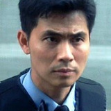 Chang Kin-Yung — Senior Police Officer (uncredited)
