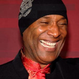 Paul Mooney — Man at Counter
