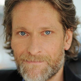 Майкл Лоуренс — Newscaster