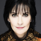 Enya — Self (archive footage)