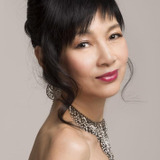 覃恩美 — Wife of Gambling Den Owner