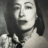 Lupe Carriles — Maid at Carlota's home (uncredited)