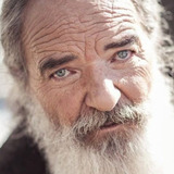 Greg Bronson — Reporter (uncredited)