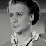 Sally Shepherd — Tea Room Hostess (uncredited)