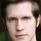 Adam James Johnston — Adam Clayton (uncredited)