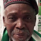 Olu Jacobs — Commissioner Batak