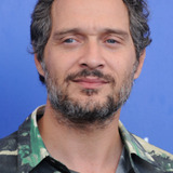 Claudio Santamaria — Dive Shop Clerk