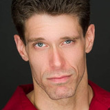 Matthew Fowler — Auctioneer on Microphone