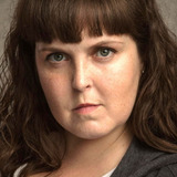 Kelly Coughlin — Officer Blumenthal