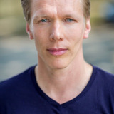 Brett Alexander Davidson — Bartender (uncredited)