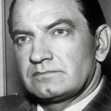 Bruce Gordon — Cop at Williamsburg Bridge (uncredited)