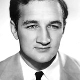 Tom Harmon — Sportscaster (uncredited)