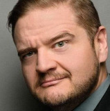 Майк 'Наг' Нахрганг — Parking Attendant