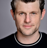 Brett Holland — Room Service Waiter