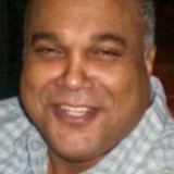 Kamal Ahmed — Man on phone (voice)