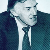 Robert Holmes — (archival footage)