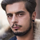 Gianluca Tamburella — Bar drinker (uncredited)