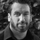 Tom McArdle — Wrestling Match Announcer (uncredited)