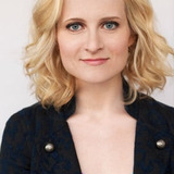Leandra Ryan — Yoga Instructor (uncredited)