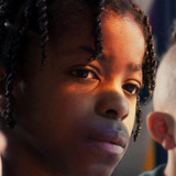 Benjamin Mukadi Kanda van de Kamp — Devin (age 10)