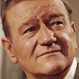 John Wayne — Self (archive footage)(uncredited)
