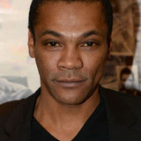 Adama Niane — Man in Pool Hall