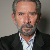 Juergen J. Straub — Ringside Boxing Pundit (uncredited)