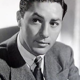 Wally Cassell — Cipriano's Doorman (uncredited)